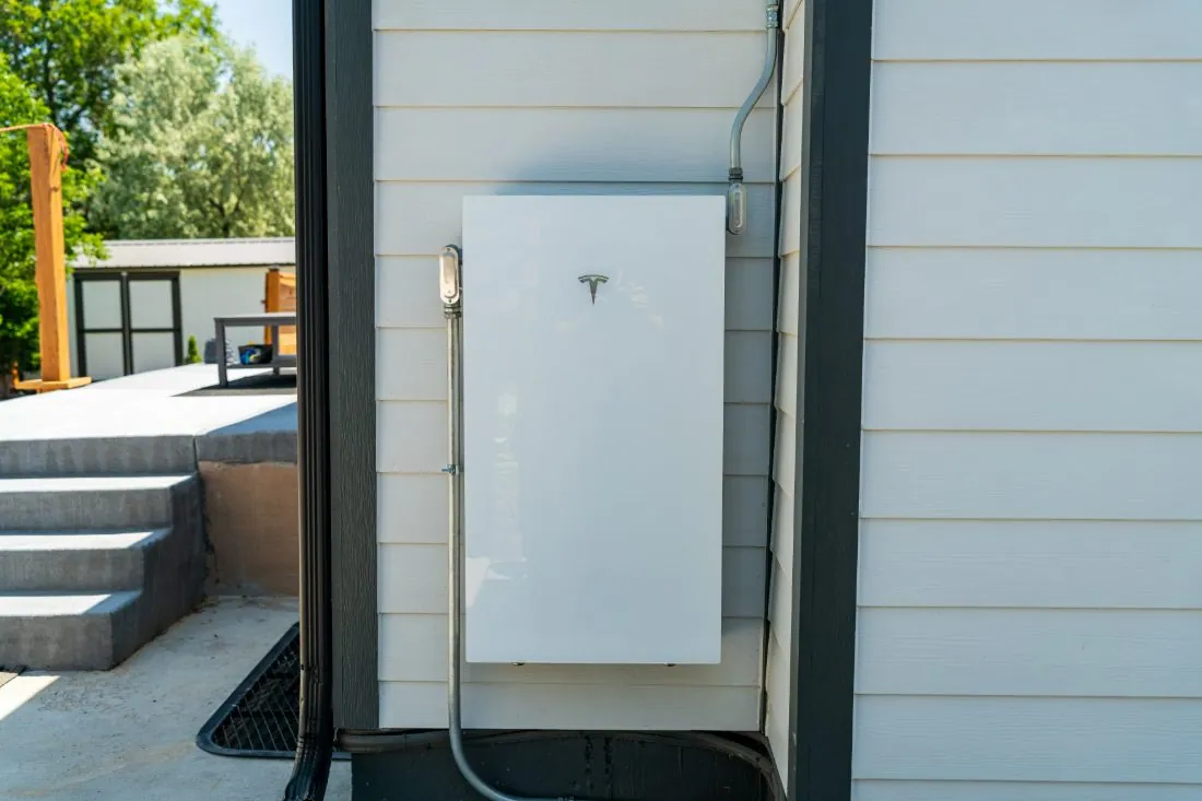 Tesla Powerwall on garage wall
